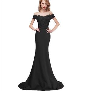 Black formal gown with small lace train.